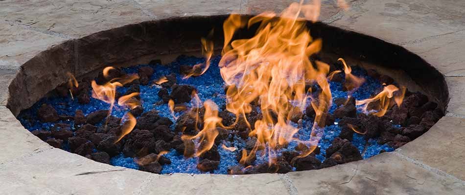 Custom gas burning fire pit installation in Granger, IN.