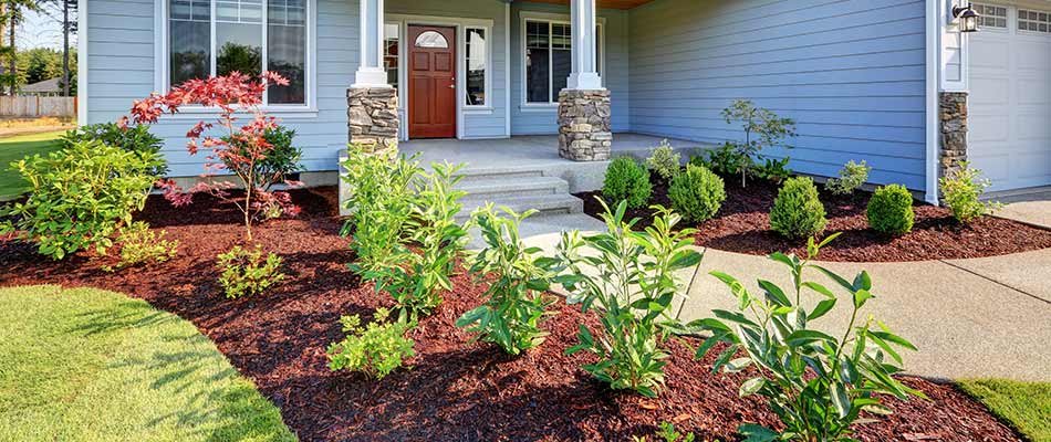 Landscape bed and mulch installation at a Granger, IN home.