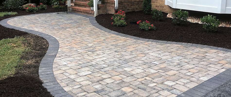 Custom paver patio and outdoor lighting installed at a residential property in South Bend, IN.