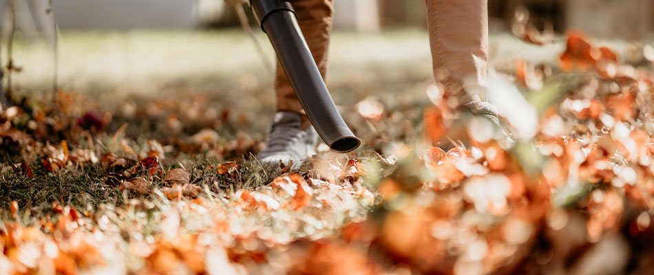 Leaf blower removing fall leaves in Bristol, IN.