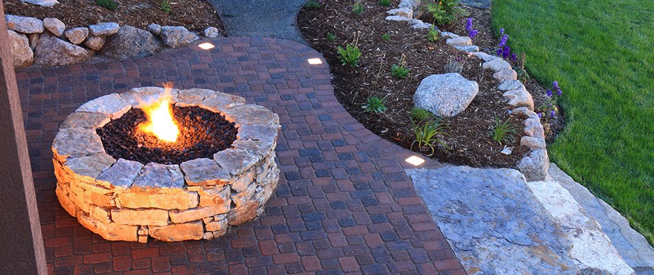 Round stone firepit recently built behind a home in South Bend, IN.